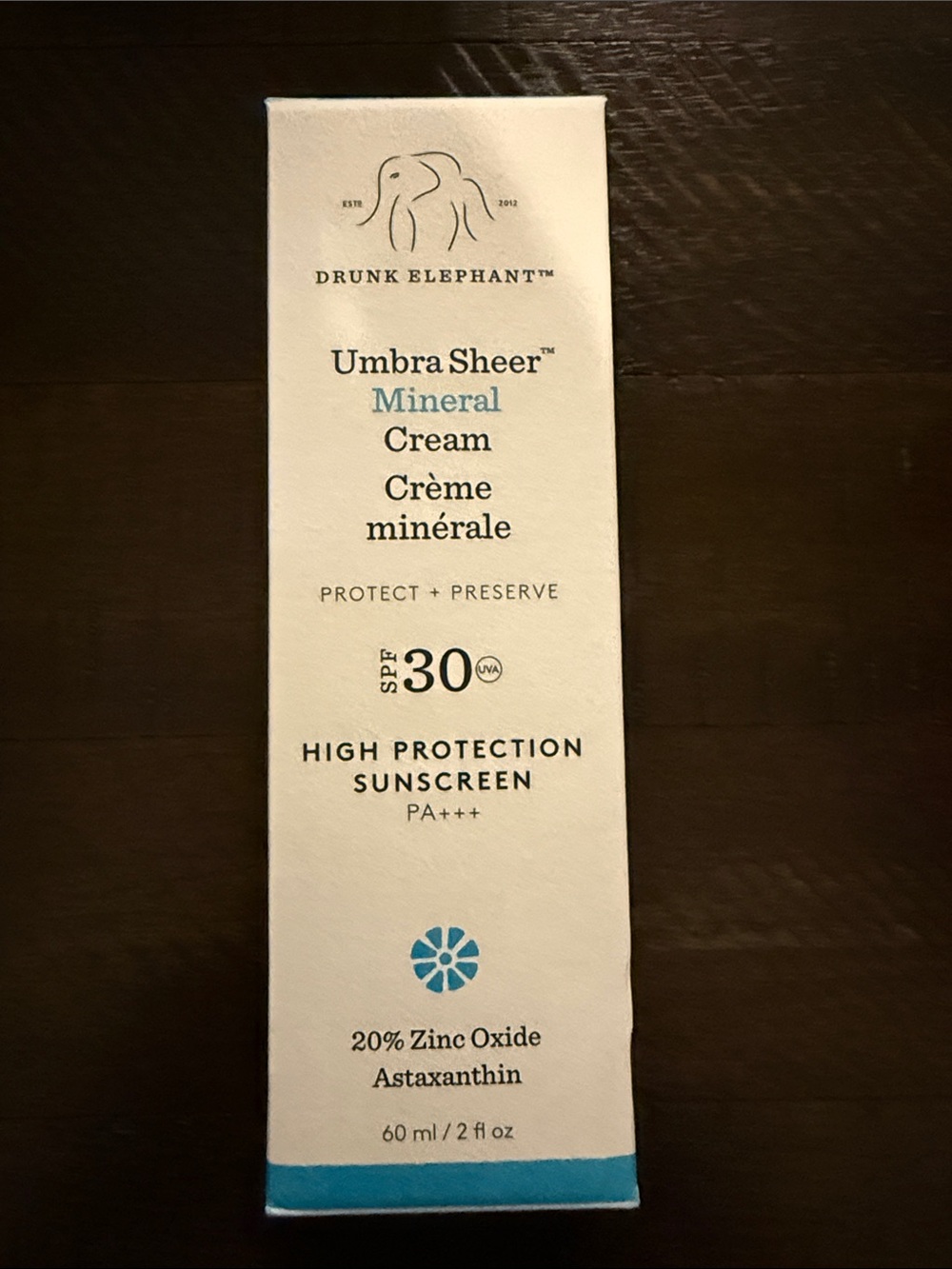 Drunk Elephant Umbra Sheer Mineral Cream SPF 30 - White and Blue Accents